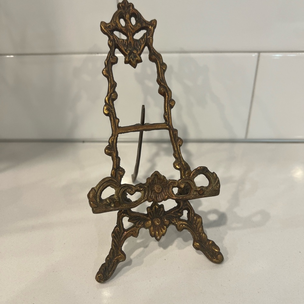 Ornate brass easel